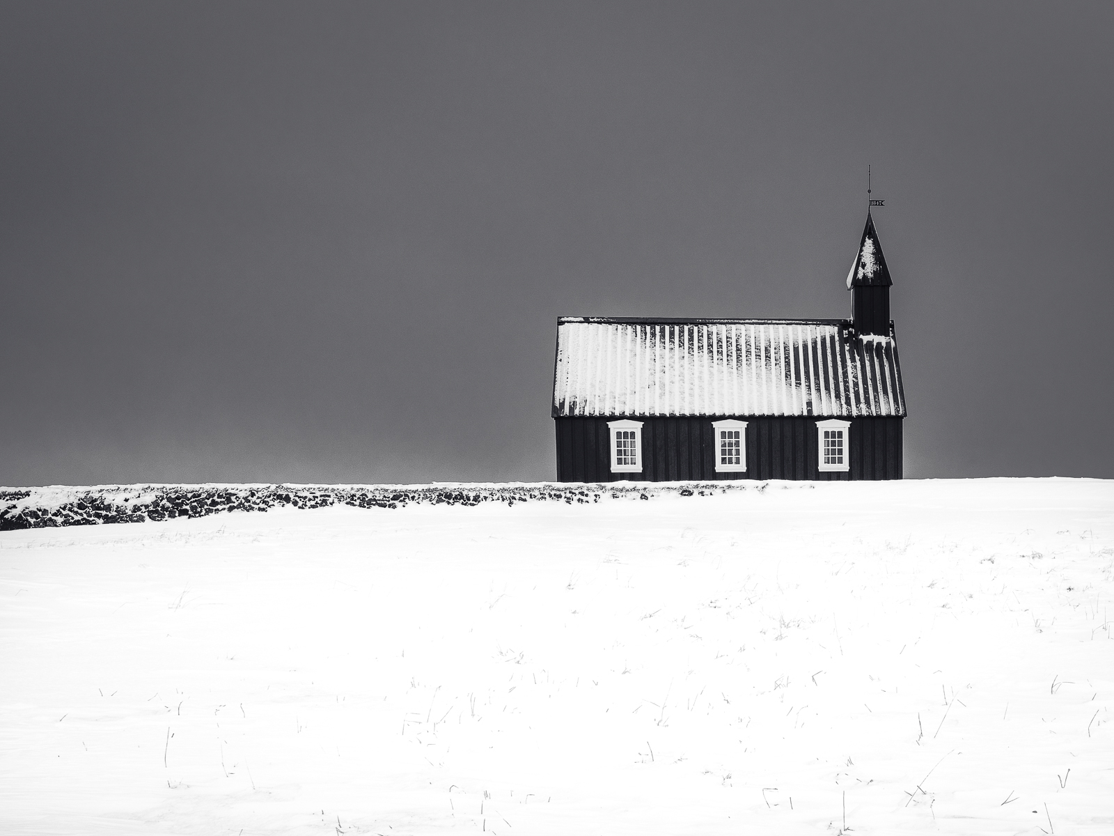 CHURCH IN THE SNOWSCAPE ICELAND by Gary Honeysett